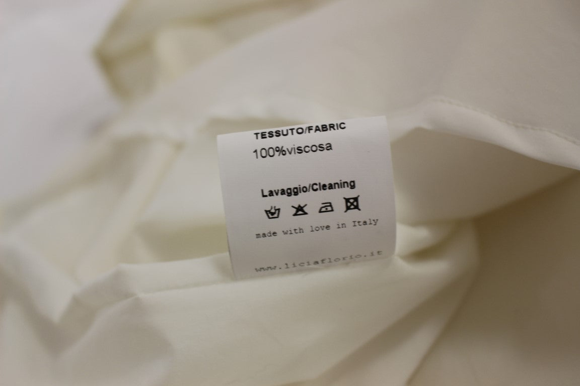 Robe de thé blanche dos nu longueur genou
