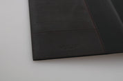 Bifold-Reisebrieftasche aus schwarzem Leder mit Logo