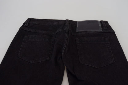 Jean slim taille basse en denim de coton noir