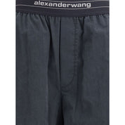 Trousers with elastic waistband and contrasting jacquard logo